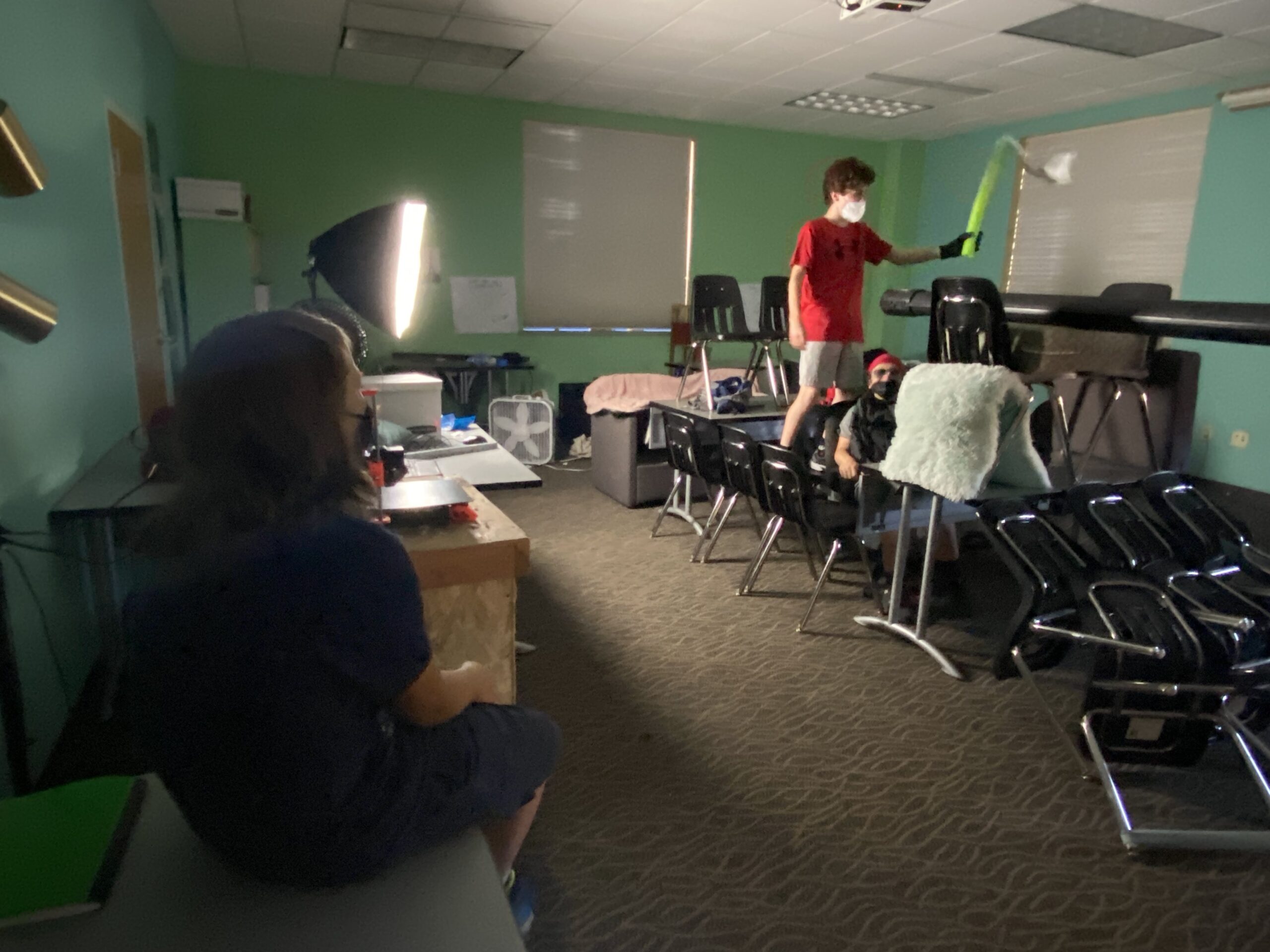 Students producing videos in the classroom.